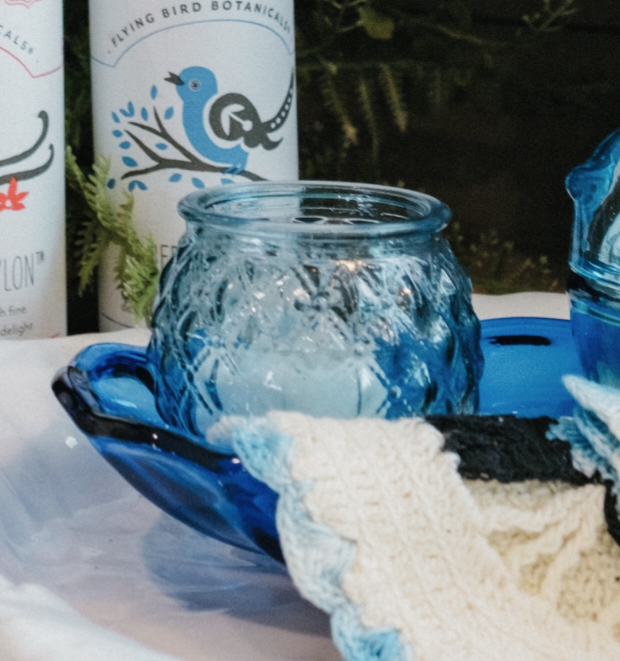 Blue votive and candle