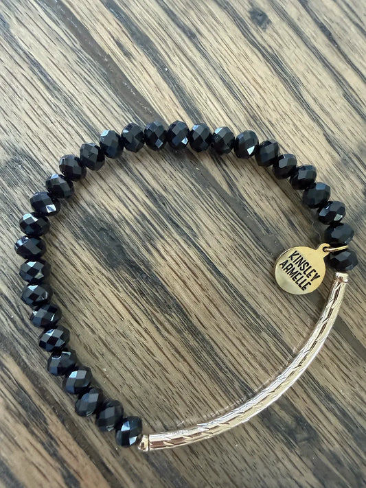 Kinsley Armelle Black Stone with Plated Gold Paved Bar Bracelet